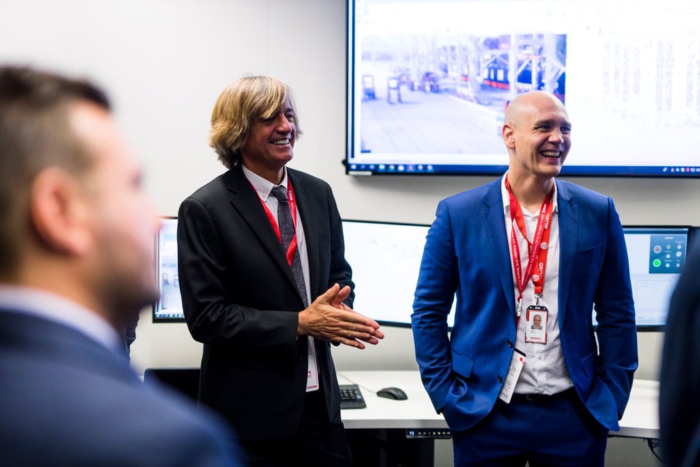 John Alvarez and Mika Seppä speaking together at Kalmar's Explore Automation 2019 event.